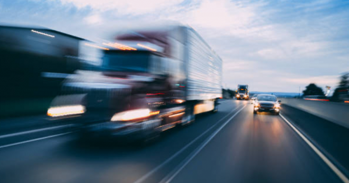 blurred-truck-highway-1200x628